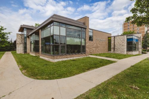 Glass and brick building with the words Calvin Park Branch