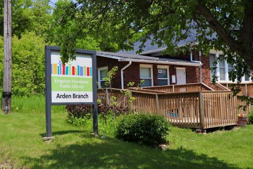 Brick building with wooden ramp at the front and a KFPL Arden Branch sign on the left.