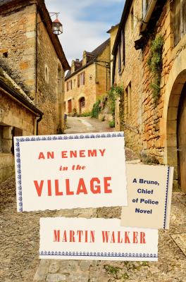 An enemy in the village by Martin Walker, (1947 January 23-)